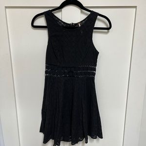 Black cutout eyelet mini dress
